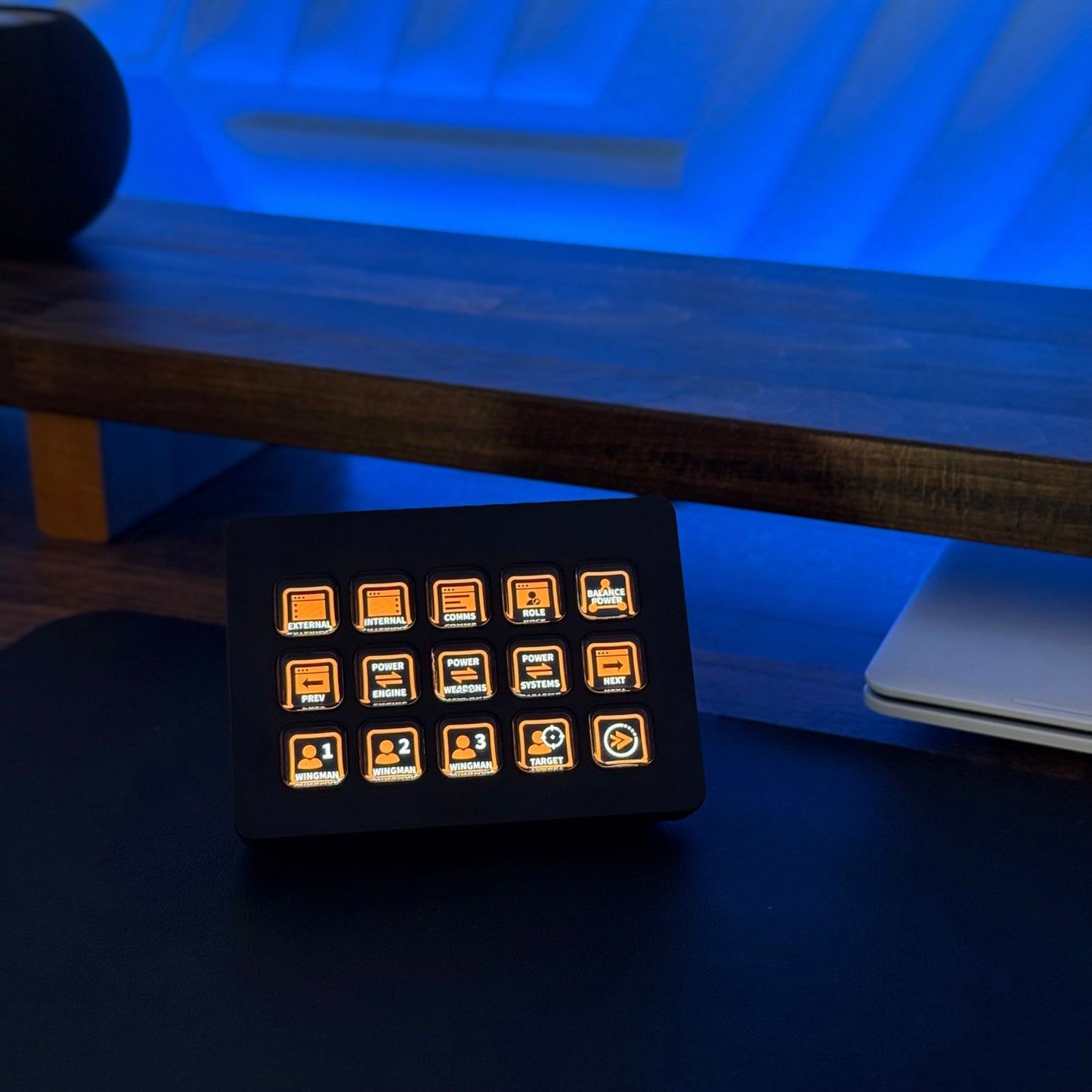 Stream Deck on a desk showing Elite Dangerous icons